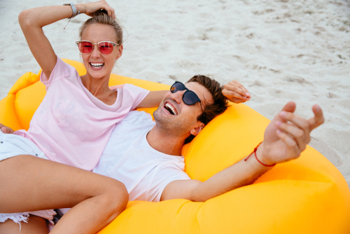 Couple Having Fun on Raft