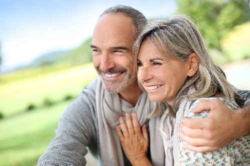 Middle-Aged Couple Happy after Cataract Surgery