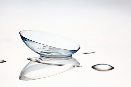 Close-up of Contact Lens on Reflective Surface