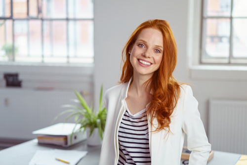 woman smiling in an office