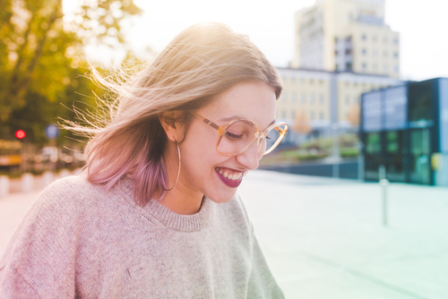 Woman with eyeglasses considering LASIK