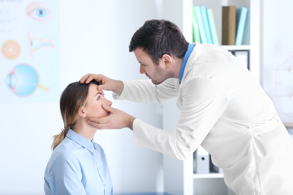 Woman having eye examined